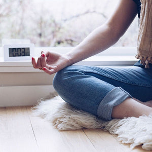 Sitting in meditation with the Awake Mindfulness Clock
